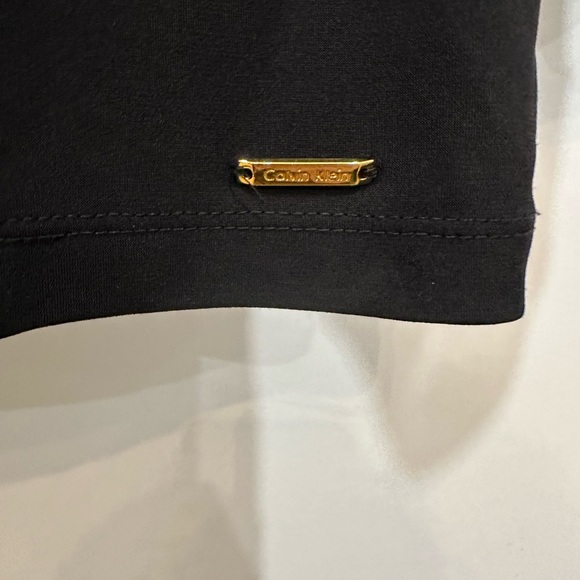 Calvin Klein black long sleeve with mesh polkadot three-quarter length sleeves - Picture 2 of 5